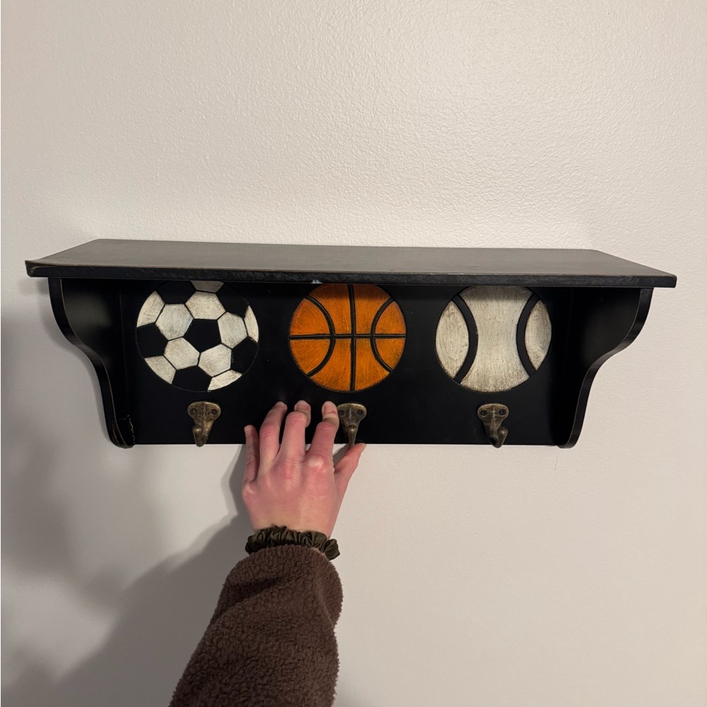 Black Sports-Themed Wall Shelf with Hooks